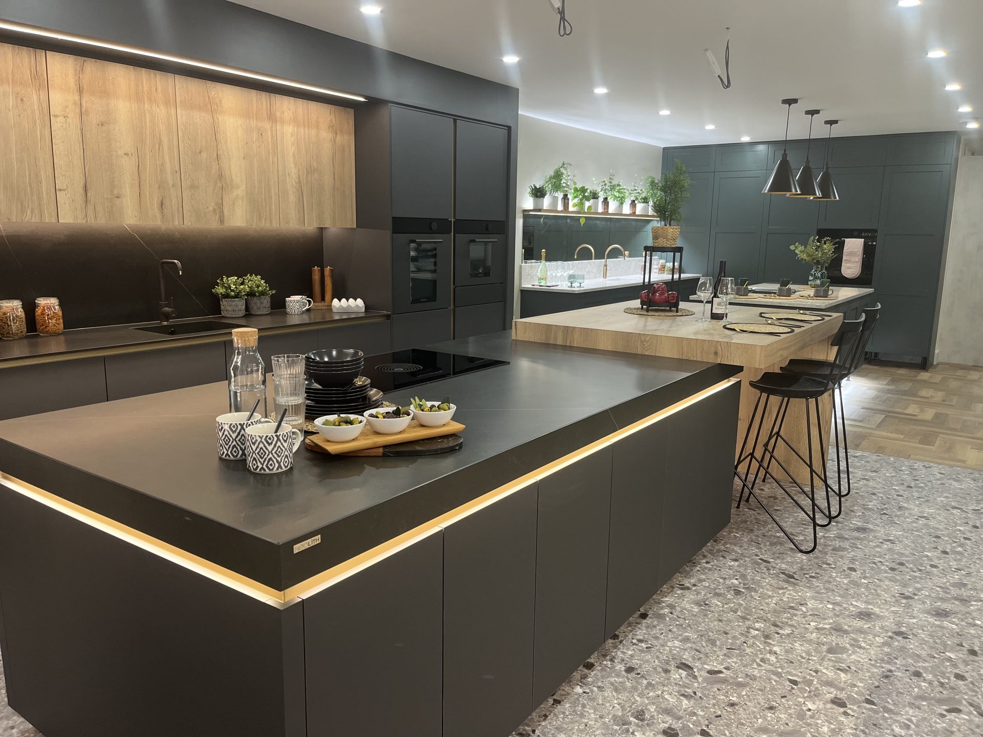 Kitchen showroom styling in Lincoln Colourhill, modern greys and wood
