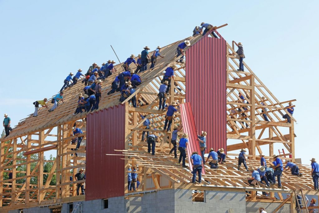 Interior design, project management - many people working on house